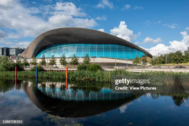 General view of Aquatics Centre, with River Lea in foreground. London Aquatics Centre, London, United Kingdom. Architect: Zaha Hadid Architects, 2013.