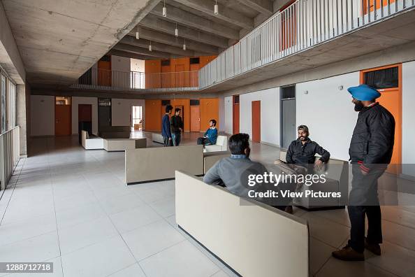 Dometry Multi-level interior of dormitory with common space, atrium and... News ...