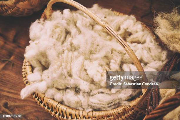 sheep wool basket to be spun. - wool stock pictures, royalty-free photos & images