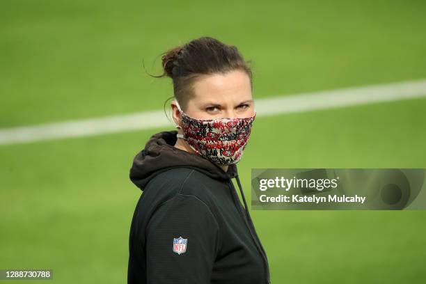 San Francisco 49ers offensive assistant Katie Sowers looks on during warm ups before the game between the San Francisco 49ers and the Los Angeles...