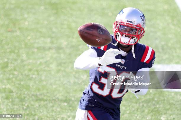 Jason McCourty of the New England Patriots warms up before the game against the Arizona Cardinals at Gillette Stadium on November 29, 2020 in...