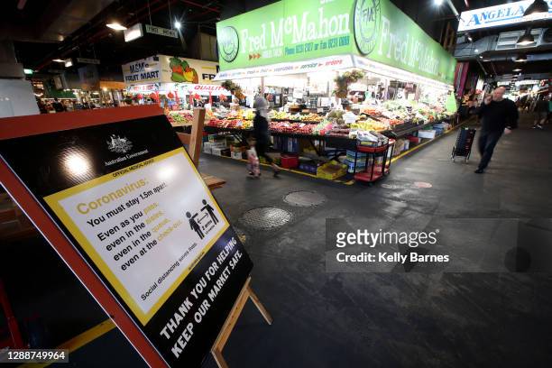 Sign on COVID-19 regulations is displayed at the Adelaide Central Market on December 01, 2020 in Adelaide, Australia. COVID-19 restrictions have...
