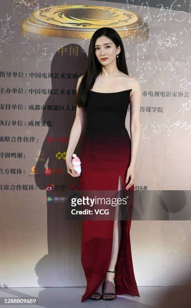 Actress Maggie Jiang Shuying holding a hand warmer attends the 7th awards ceremony of the Actors of China on November 29, 2020 in Chengdu, Sichuan...