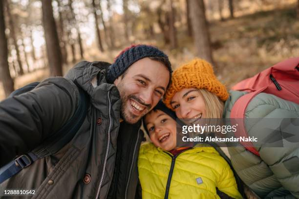 winter family portrait - december 6 stock pictures, royalty-free photos & images