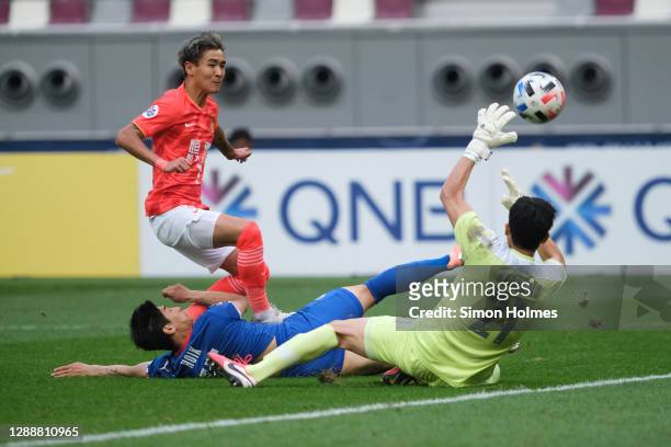 Wei Shihao of Guangzhou Evergrande scores during the AFC Champions League Group G match between Guangzhou Evergrande and Suwon Samsung Bluewings at...