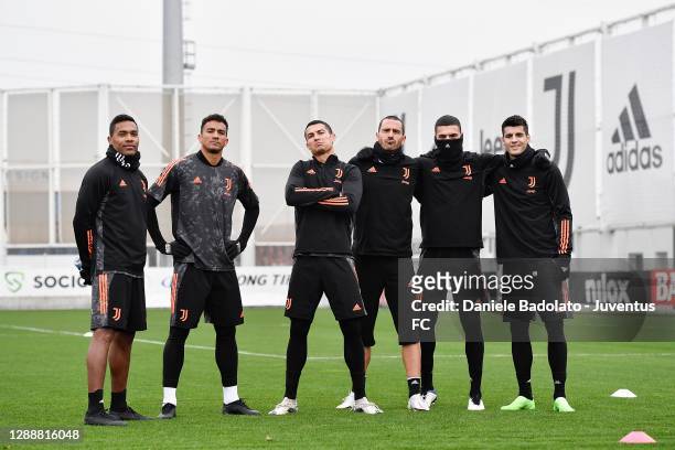 Juventus players Alex Sandro, Danilo, Cristiano Ronaldo, Leonardo Bonucci, Merih Demiral and Alvaro Morata during a training session ahead of the...