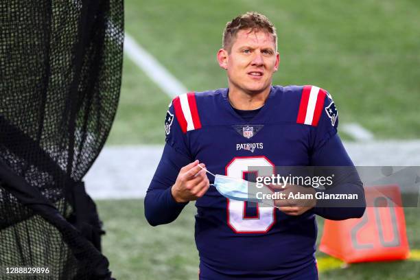 Nick Folk of the New England Patriots walks off the field after a game against the Arizona Cardinals at Gillette Stadium on November 29, 2020 in...