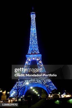 The Eiffel Tower in the colors of the European Union. Overview of Paris. Paris , March 27th, 2017