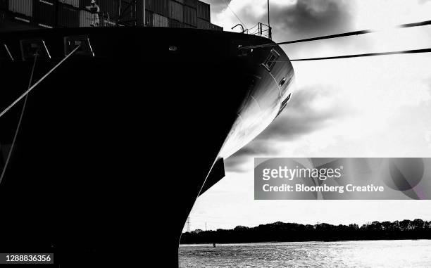 ship moored at quay - ships bow stock pictures, royalty-free photos & images