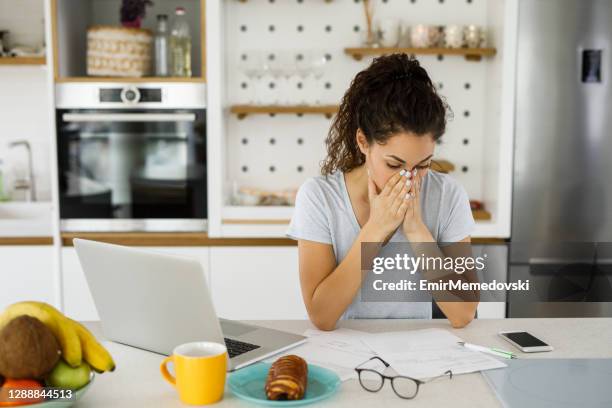 woman with financial problems - electricity bill stock pictures, royalty-free photos & images