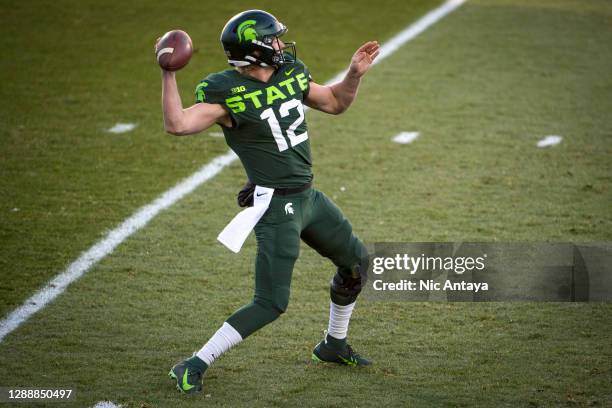 Rocky Lombardi of the Michigan State Spartans throws the ball against the Northwestern Wildcats during the first quarter at Spartan Stadium on...