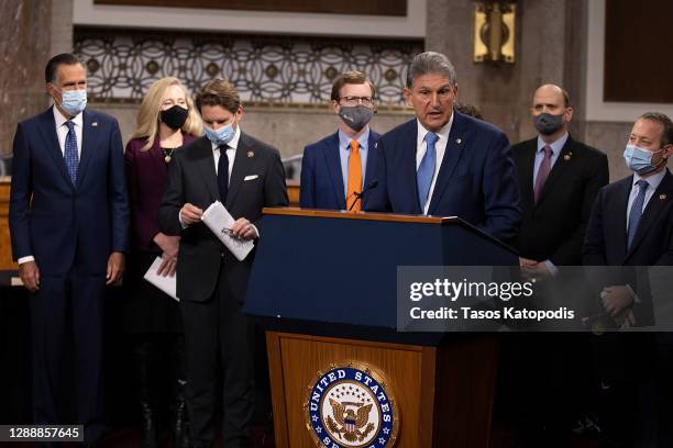 Sen. Joe Manchin speaks alongside a bipartisan group of Democrat and Republican members of Congress as they announce a proposal for a Covid-19 relief...