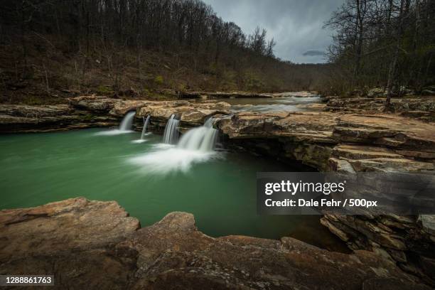 scenic view of waterfall in forest,rolla,missouri,united states,usa - missouri landscape stock pictures, royalty-free photos & images