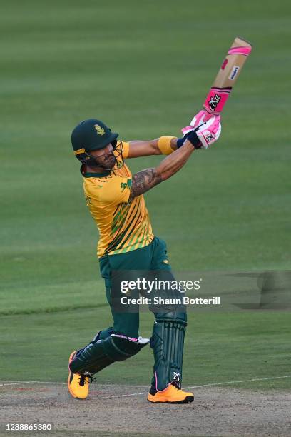 Faf du Plessis of South Africa hits a 6 during the 3rd Twenty20 International between South Africa and England at Newlands Cricket Ground on December...