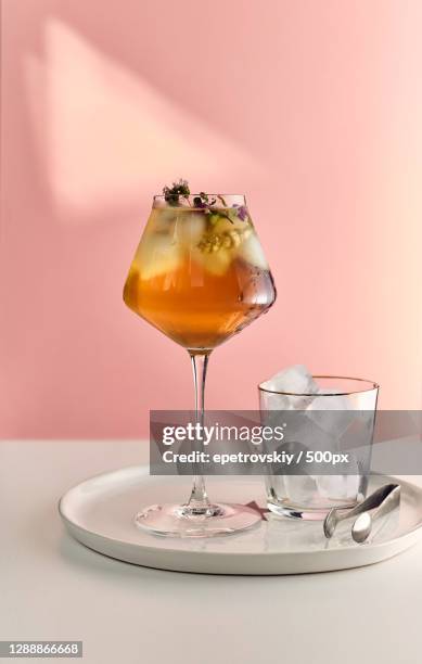 close-up of drink on table against wall - zitronen feld stock-fotos und bilder