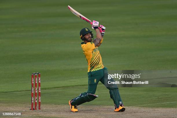 Faf du Plessis of South Africa hits a 6 during the 3rd Twenty20 International between South Africa and England at Newlands Cricket Ground on December...