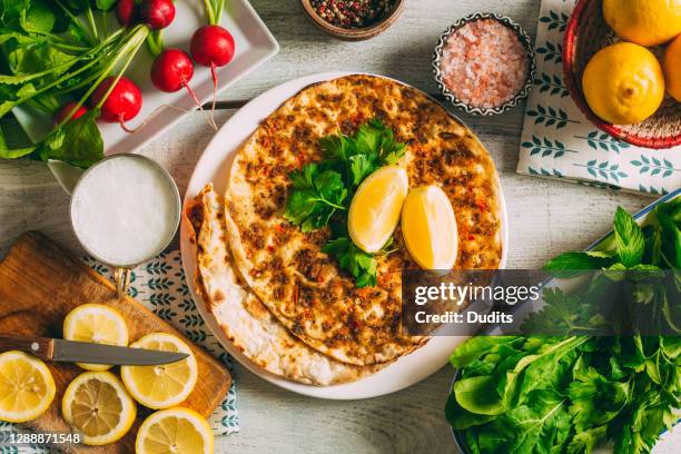 flat lay lahmacun is turkish style pizza with meat. - turkish food stock pictures, royalty-free photos & images