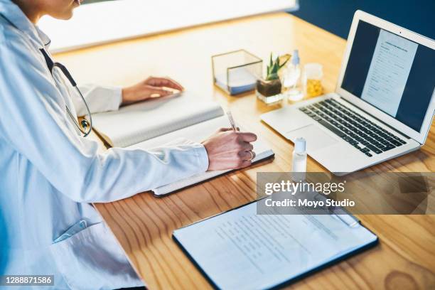 writing the story of medical success - medical research paper stock pictures, royalty-free photos & images