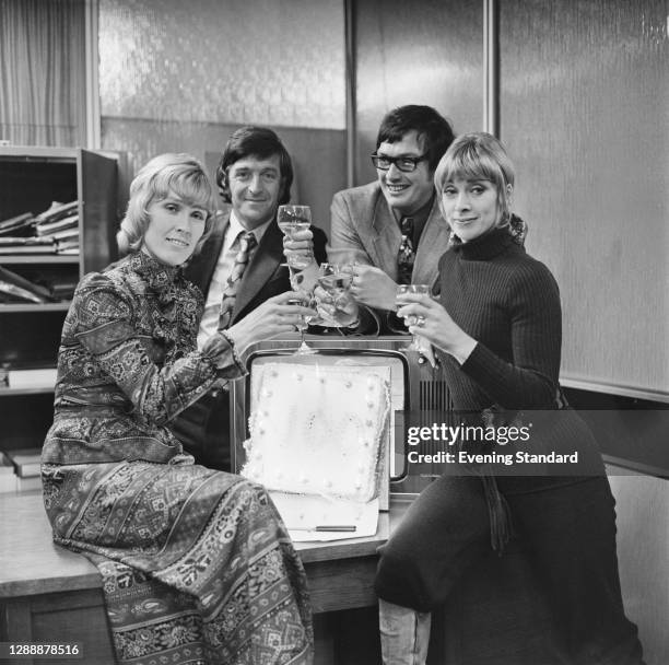 From left to right, British television presenters Mary and Michael Parkinson, Allan Hargreaves and Renny Lister, UK, November 1971.