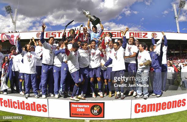 Players of Chivas celebrate with the trophy during the final match of the Apertura Tournament 2006 on December 10 , 2006 on Nemesio Diez Stadium in...