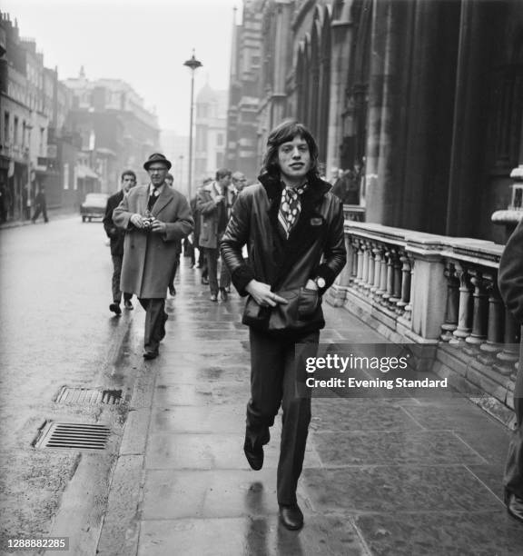 English singer Mick Jagger of the Rolling Stones attends the Court of Appeal in London, UK, where band member Brian Jones is attempting to have his...