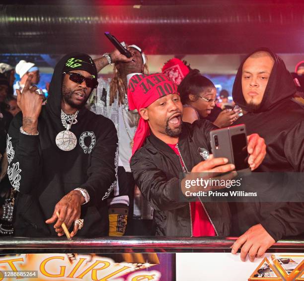 Chainz, Lil Wayne, Reginae Carter and Juvenile attend Reginae Carter 22 Hot Girl Birthday at Republic Lounge on November 29, 2020 in Atlanta, Georgia.