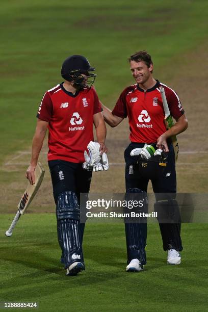 Jos Buttler and Dawid Malan of England celebrate after securing England a 3-0 series victory during the 3rd Twenty20 International between South...