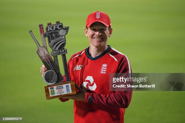 Captain Eoin Morgan of England holds the Series Winner's Trophy at the end of the 3rd Twenty20 International between South Africa and England at...