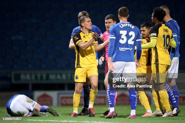 Alfy Whittingham of Aldershot reacts after being shown a red card at Technique Stadium on December 01, 2020 in Chesterfield, England. Sporting...