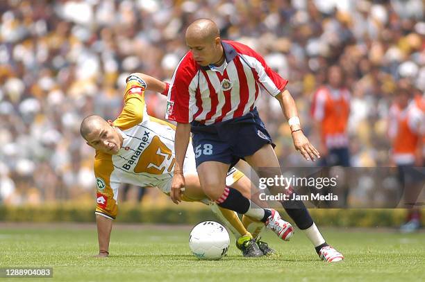 Dario Veron of Pumas and Adolfo bautista of Chivas fight for the ball during the final match Pumas against Chivas of the Clausura Tournament 2004 at...