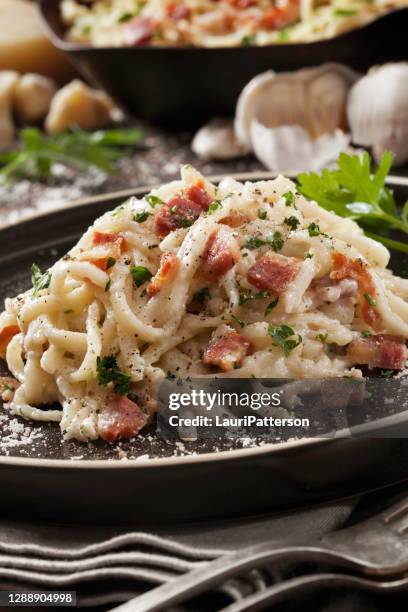 linguine carbonara with crispy pancetta - pancetta stock pictures, royalty-free photos & images