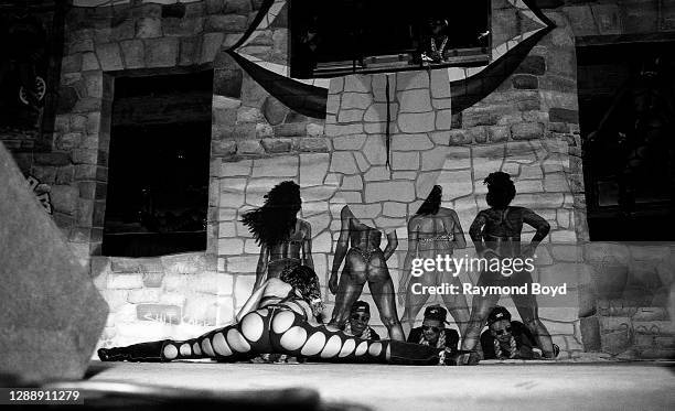 Mr. Mixx and a 2 Live Crew dancer performs at the International Amphitheatre in Chicago, Illinois in October 1989.