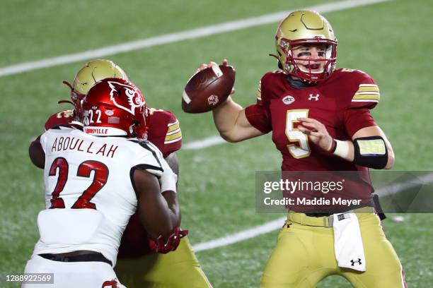 Phil Jurkovec of the Boston College Eagles makes a pass against the Louisville Cardinals at Alumni Stadium on November 28, 2020 in Chestnut Hill,...