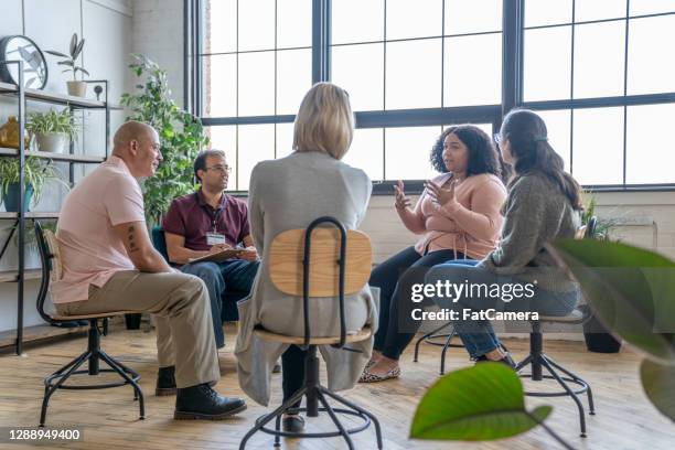 group therapy session - dependency stock pictures, royalty-free photos & images