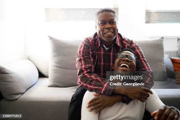 father and son - african american elder stock pictures, royalty-free photos & images