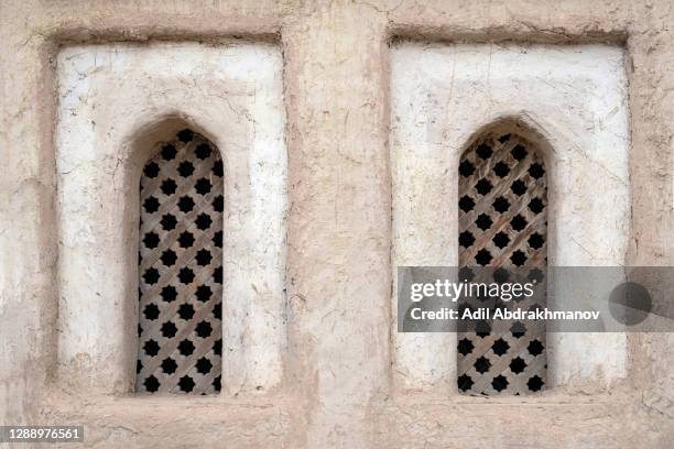 Oriental style windows with eight angle star pattern.