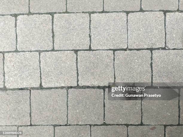 paving road in the middle town - traditional indonesian tile industry imagens e fotografias de stock