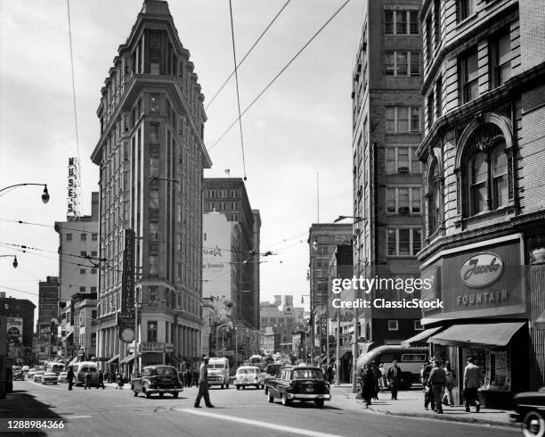 1950s The English-American Or Flatiron Building Cars Pedestrians At Broad And Peachtree Street Intersection Atlanta Georgia USA