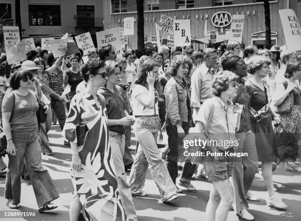 Some of the thousands of female protestors, some holding placards, during a march in support of Equal Rights Amendment No 27 to the US Constitution,...