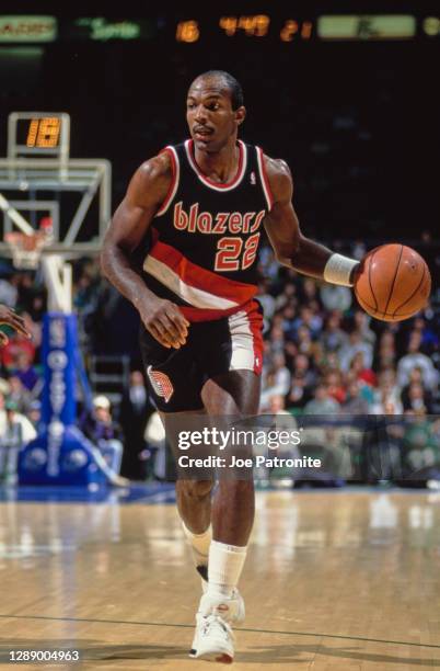 Clyde Drexler, Shooting Guard for the Portland Trail Blazers dribbles the basketball down court during the NBA Midwest Division basketball game...