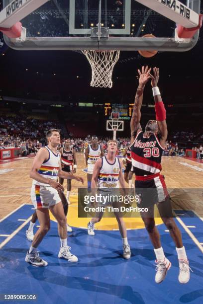 Terry Porter, Point Guard for the Portland Trail Blazers drives to the hoop during the NBA Midwest Division basketball game against the Denver...