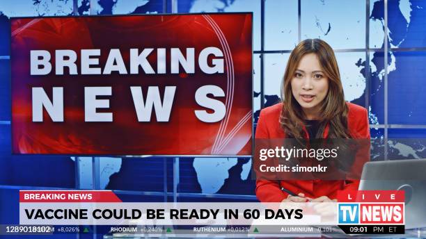 female anchor presenting the breaking news about vaccine accessibility - journalist covid stock pictures, royalty-free photos & images