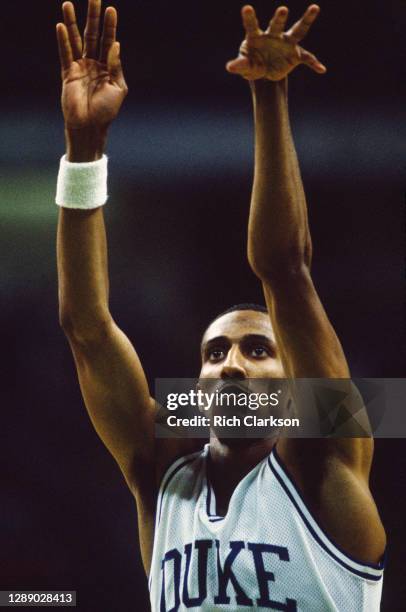 Johnny Dawkins of the Duke Blue Devils shoots against the Louisville Cardinals during the 1986 NCAA Men's Basketball Championship held at Reunion...