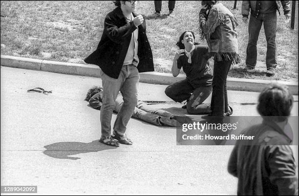 As others call for help, teenager Mary Ann Vecchio kneels beside the body of Kent State University student Jeffrey Miller who had been shot during an...