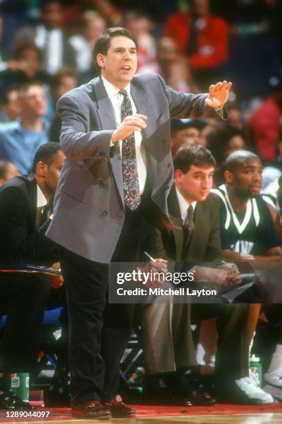 Head coach Steve Lappas of the Villanova Wildcats signals to his players during a college basketball game against the Georgetown Hoyas at U.S.Air...