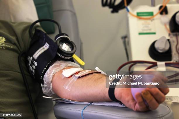 Peter Yaverbaum donates blood at a New York Blood Center in the Upper East Side neighborhood of Manhattan on December 02, 2020 in New York City....