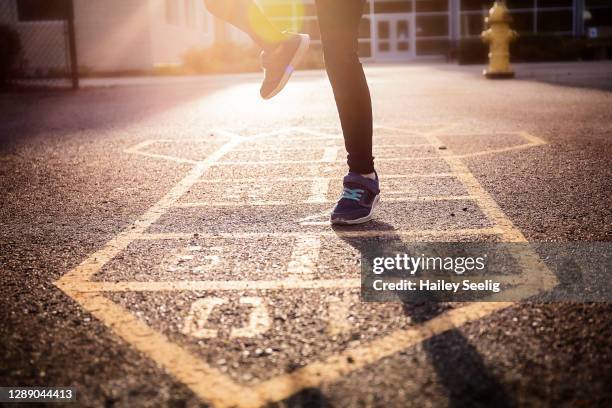 playing hopscotch - hopscotch stock pictures, royalty-free photos & images