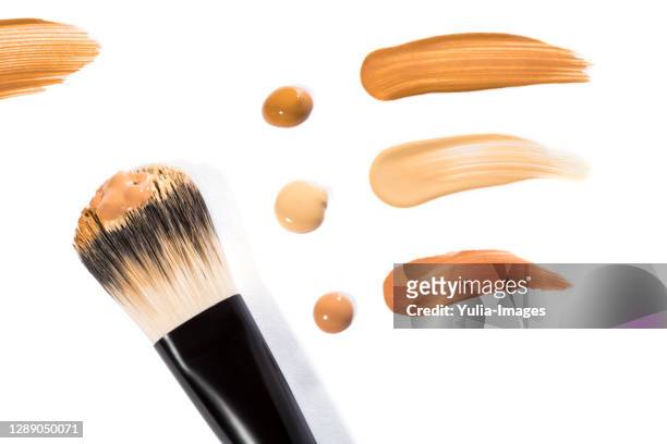 trio of beige face base foundation color in different shades - concealer stock pictures, royalty-free photos & images