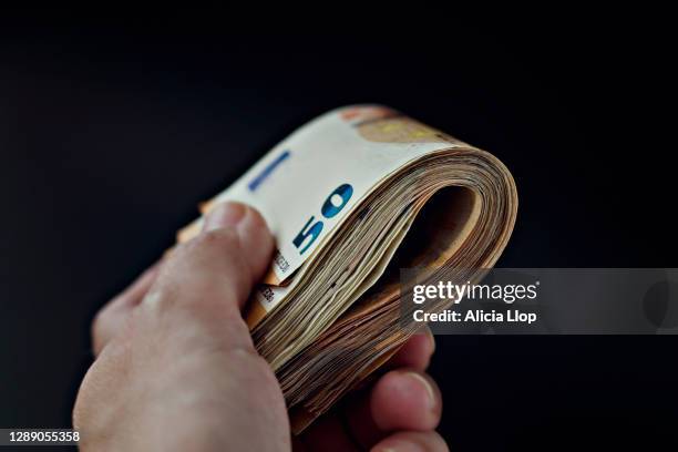 giving money - european union currency stock pictures, royalty-free photos & images