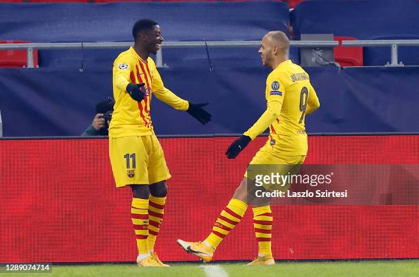 Martin Braithwaite of Barcelona celebrates after scoring their sides second goal with team mate Ousmane Dembele during the UEFA Champions League...